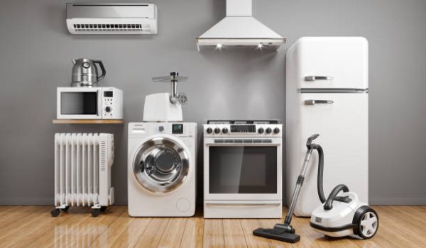 Set of home kitchen appliances in the room on the wall background. 3D render